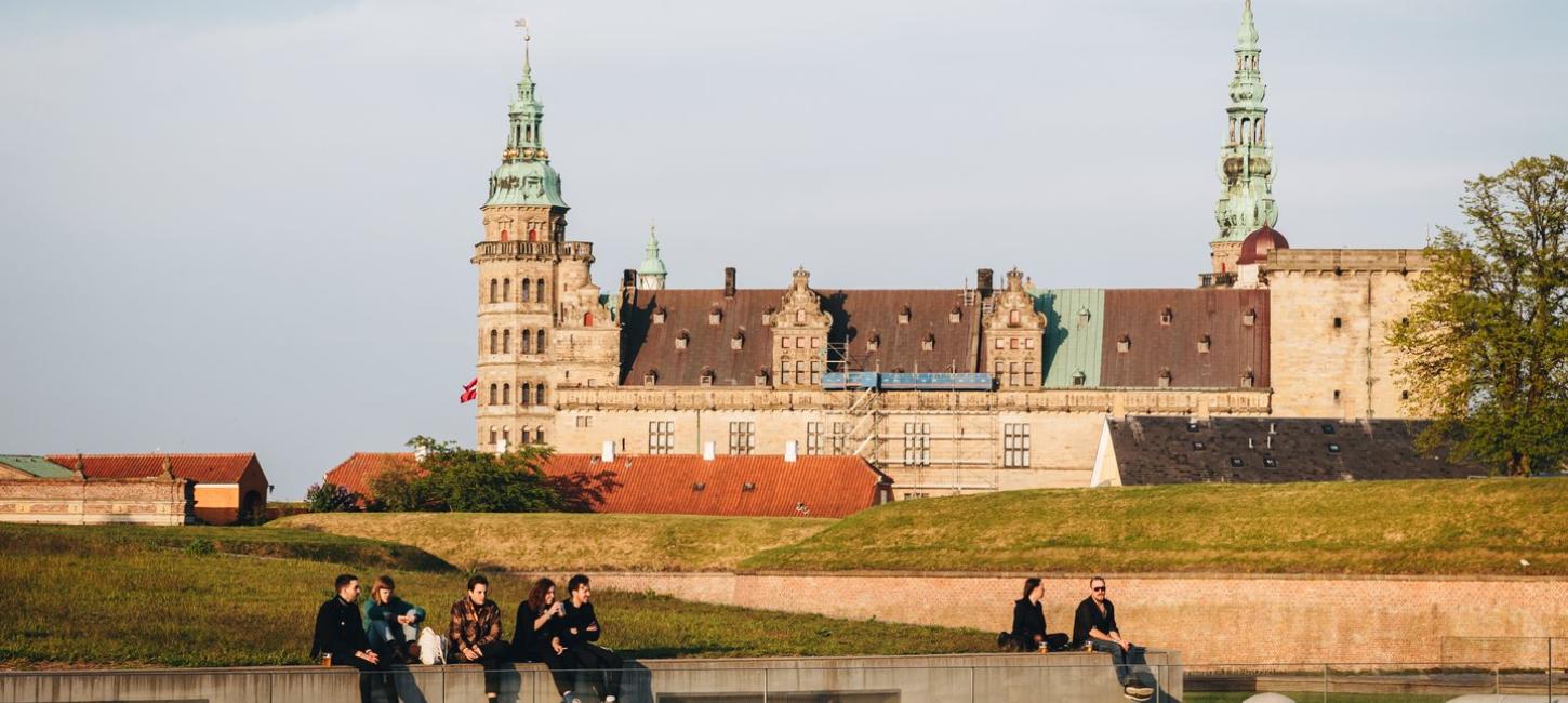People hanging out in front of Kronborg Castle in Helsingør