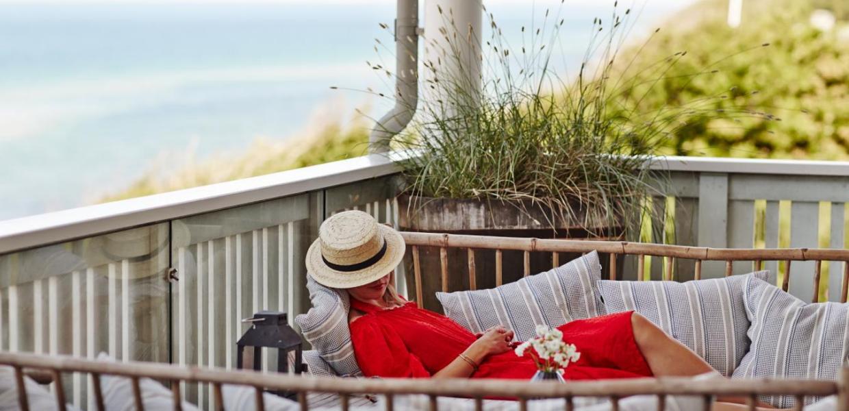 A woman relaxes at the luxury beach hotel Helenekilde Badehotel in North Zealand, Denmark