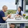 Couple eating in holiday home in North Jutland, Denmark