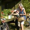 Couple grocery shopping at small farmers market in Lønstrup