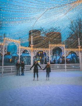 Ice skating in front of the magical Nimb Hotel in the iconic Tivoli Gardens
