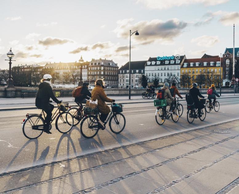 People cycling on Queen Louise's Bridge in winter, Copenhagen