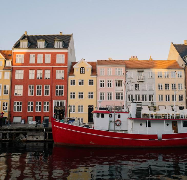 Boats and houses in Nyhavn in Copenhagen in autumn
